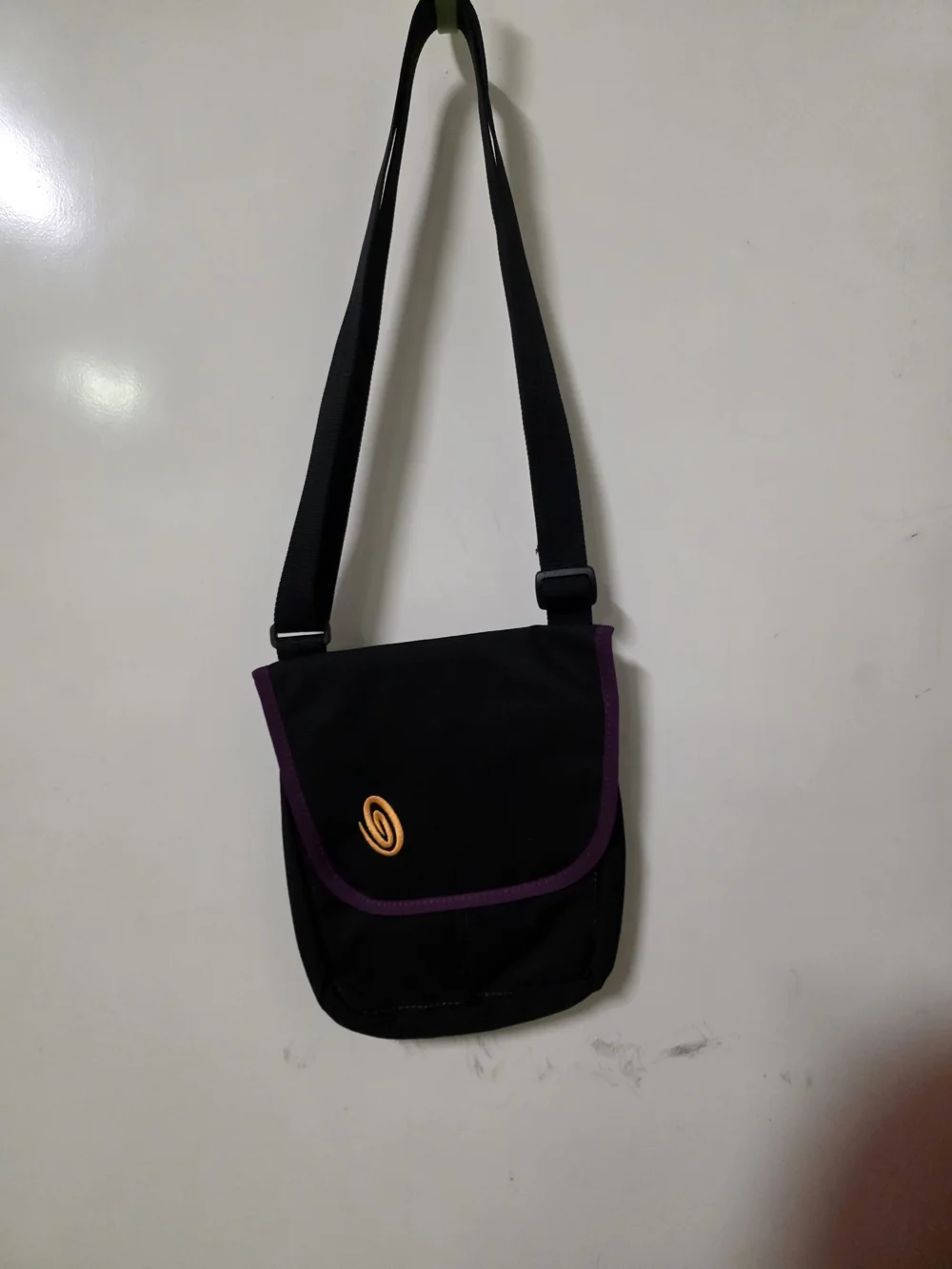Timbuk2 Black Messenger Bag with Purple Trim and Orange Logo
